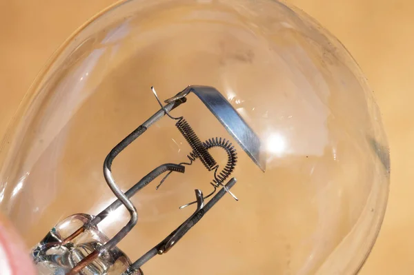 Old car envelope incandescent lamp. Close-up of filament — Stock Photo, Image