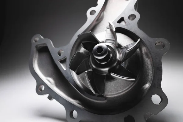 ICE liquid cooling pump. Engine coolant pump. Contrast light on gray background