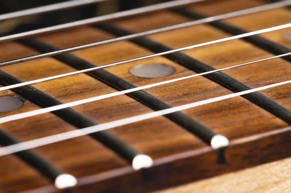 Electric guitar strings close-up. Music macro background