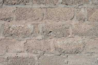 Kirli beton tuğlaların yakın çekim deseni. Çimento lekeli duvar