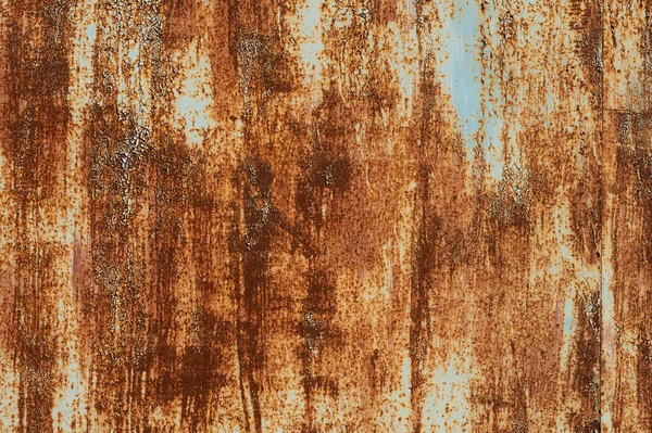 오래 된 금속 표면에 녹으로 물든 자국있는 배경붉은 페인트를 벗겨 내는 자국 — 스톡 사진