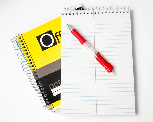 The notebook and the red handle — Stock Photo, Image