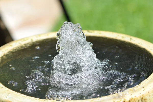 Bubbling water fountain Stock Photo