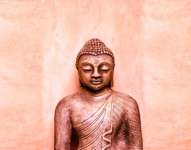 Calm smiley Buddha statue in Negombo, Sri Lanka clipart