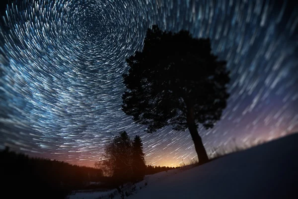 Star trails on a winter sky — Stock Photo, Image