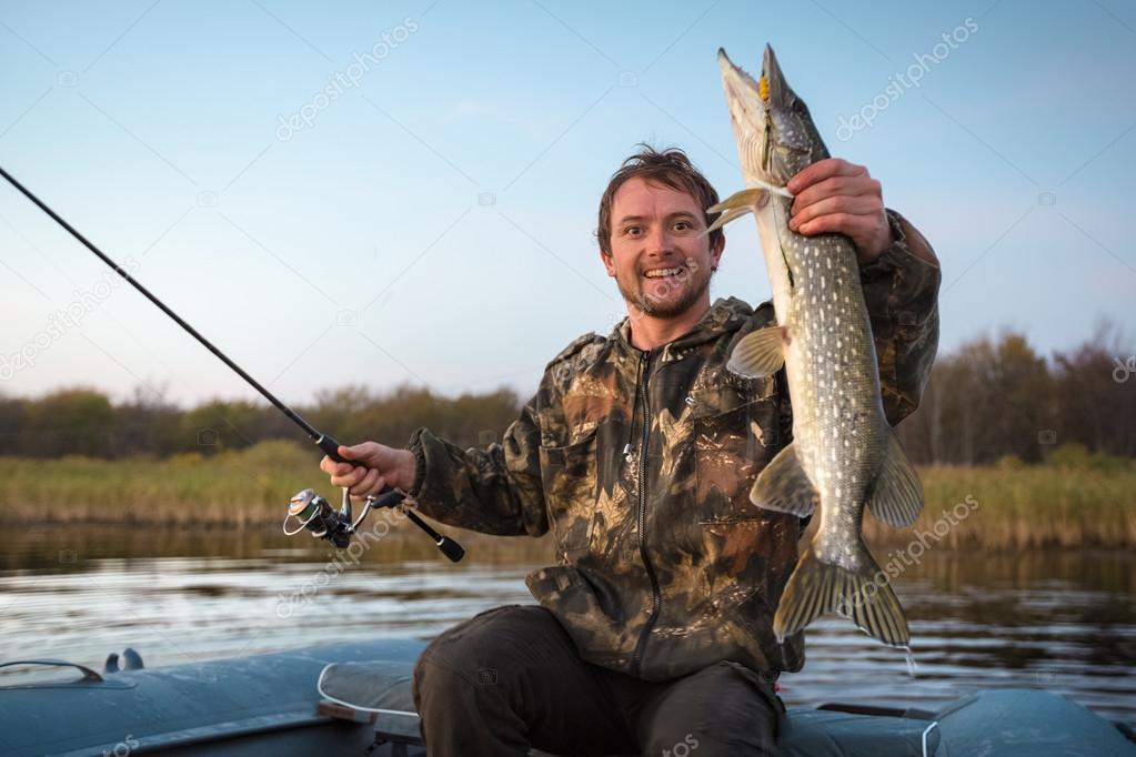 Man holding trophy fish