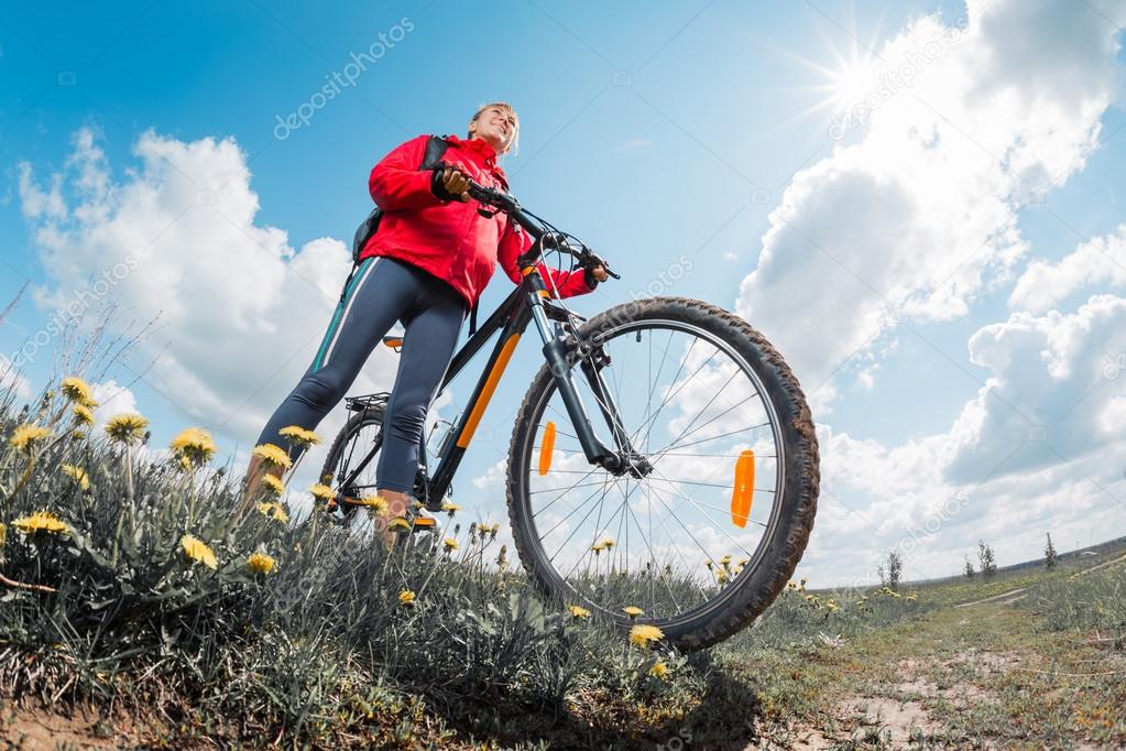 Young lady with bicycle 