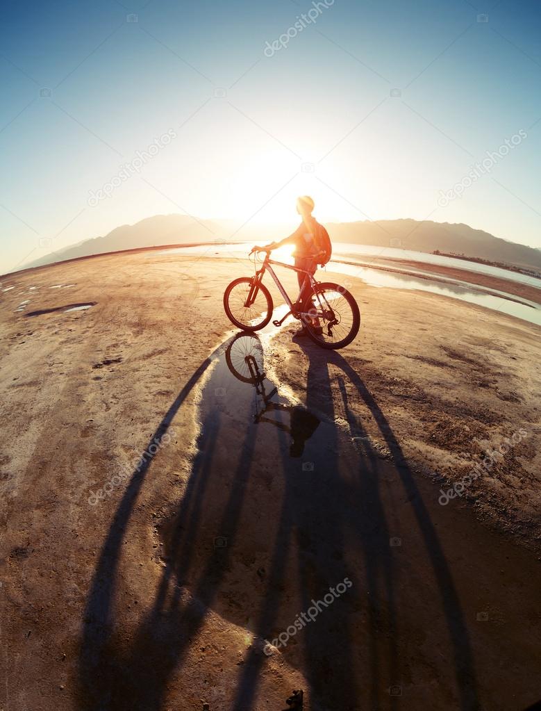 Lady with bicycle