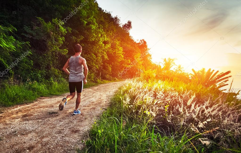 Man jogging on the road — Stock Photo © mihtiander 102185924