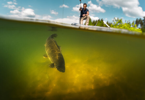fisherman with rod in the boat 