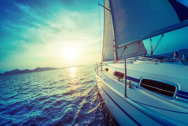 Sailing boat moving in the sea