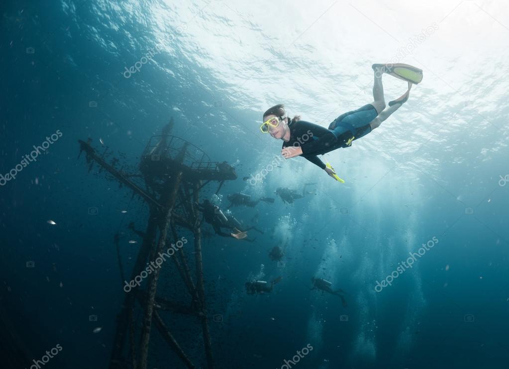 Woman diving on a breath hold