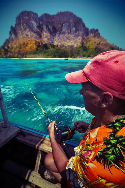 Fisherman in the boat — Stock Photo, Image