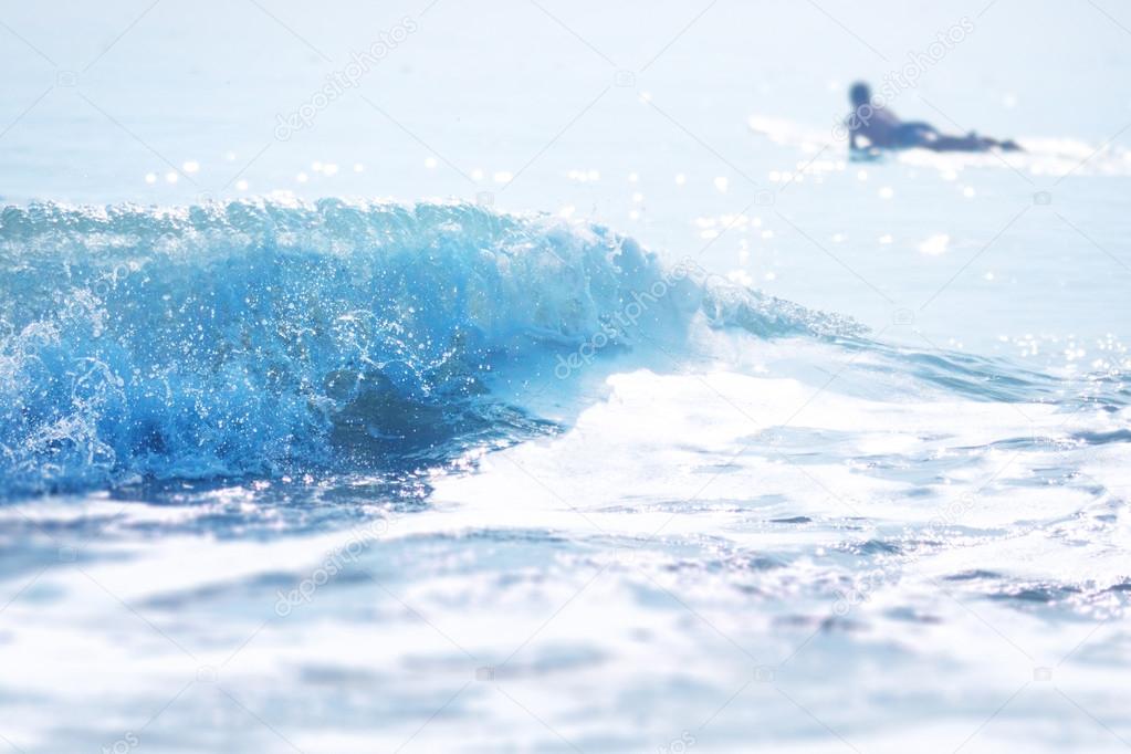 Surfer and waves