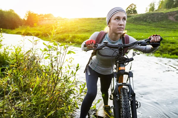 Lady with bicycle — Stock Photo, Image