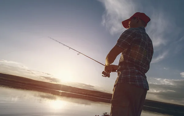 Fisherman on the pond — Stock Photo, Image