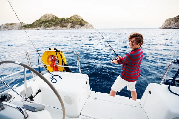 Man fishing from a boat — Stock Photo, Image
