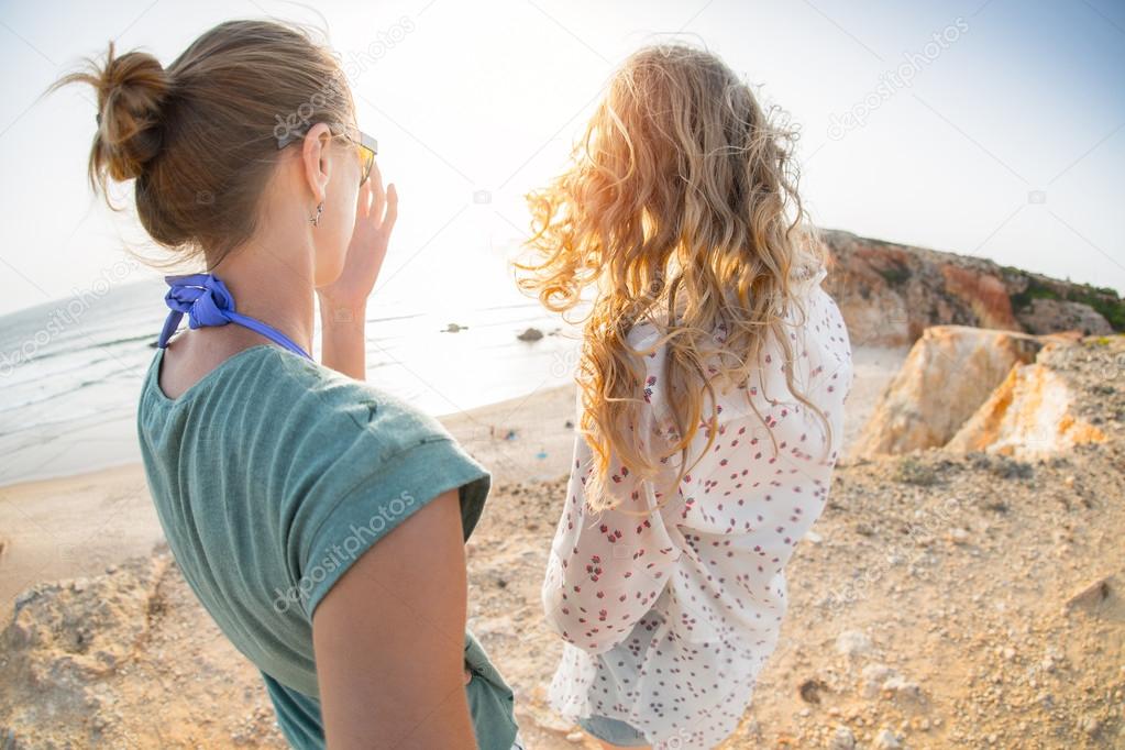 Two ladies on the sea coast