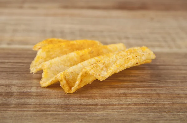 Gouden zoute chips — Stockfoto