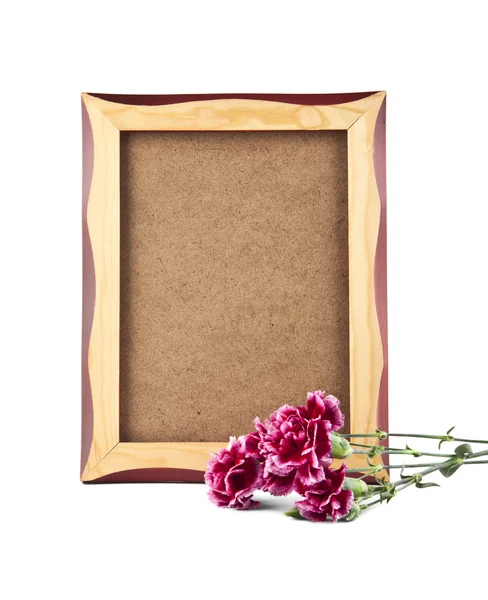 Flowers of carnation and photo frame — Stock Photo, Image