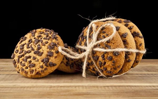Montón de galletas con un chocolate —  Fotos de Stock