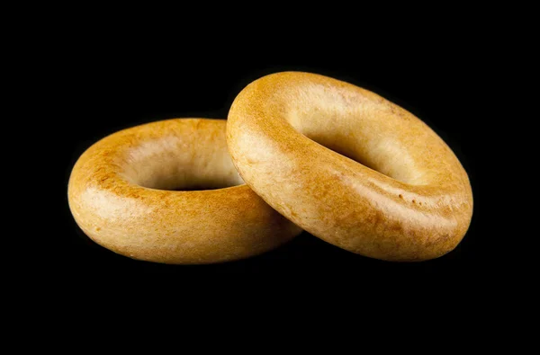 Bagel pada latar belakang hitam — Stok Foto