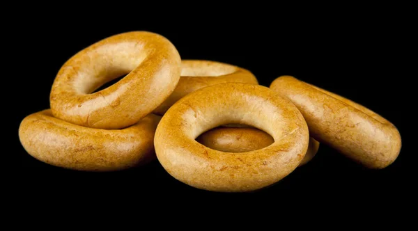 Bagels em um fundo preto — Fotografia de Stock