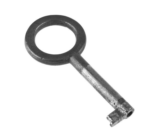 Vieja llave se aísla sobre un fondo blanco — Foto de Stock