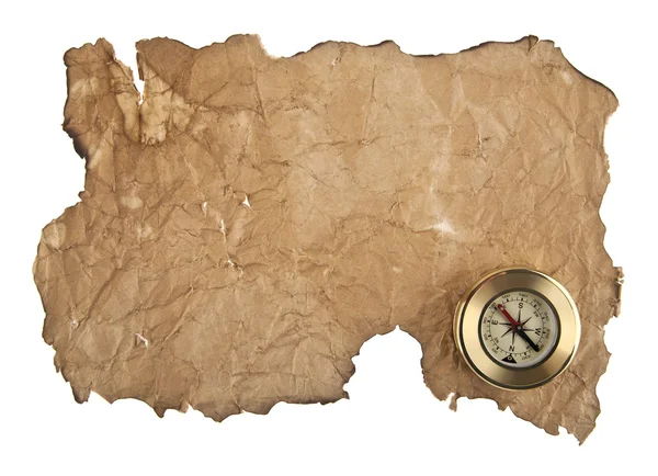 Старая бумага и компас — стоковое фото