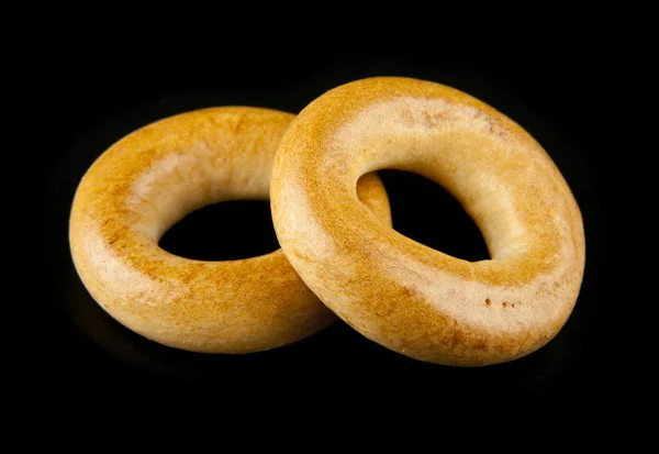 Bagels på svart bakgrund — Stockfoto