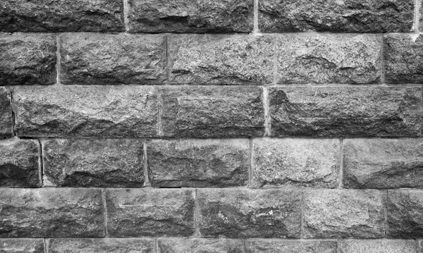 Текстура каменной стены как фон крупным планом — стоковое фото