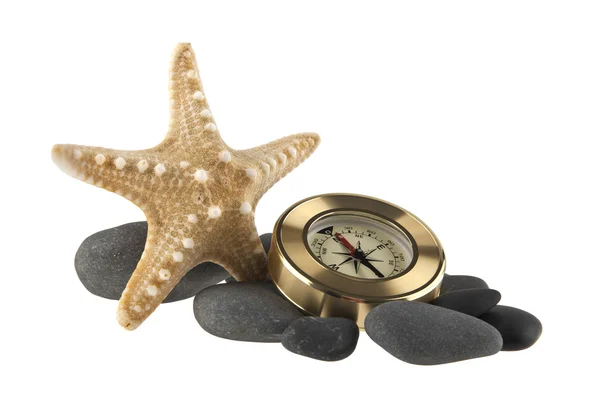 Estrellas de mar, piedras y brújula — Foto de Stock