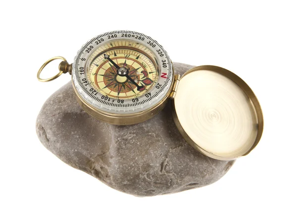 Kompas op een steen — Stockfoto