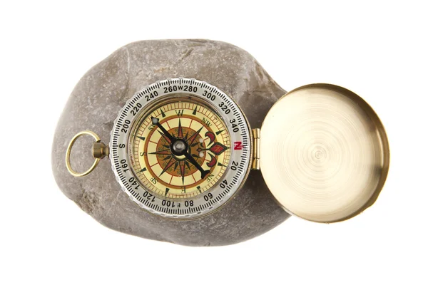 Kompas op een steen — Stockfoto