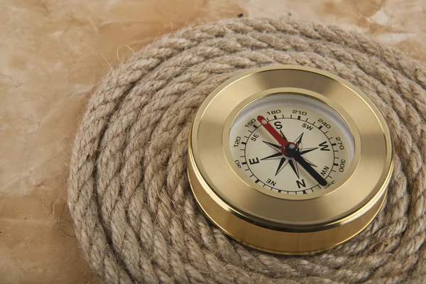 Kompasu, lano na starý papír — Stock fotografie