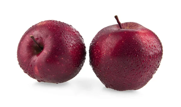 Röda äpplen med droppar vatten — Stockfoto