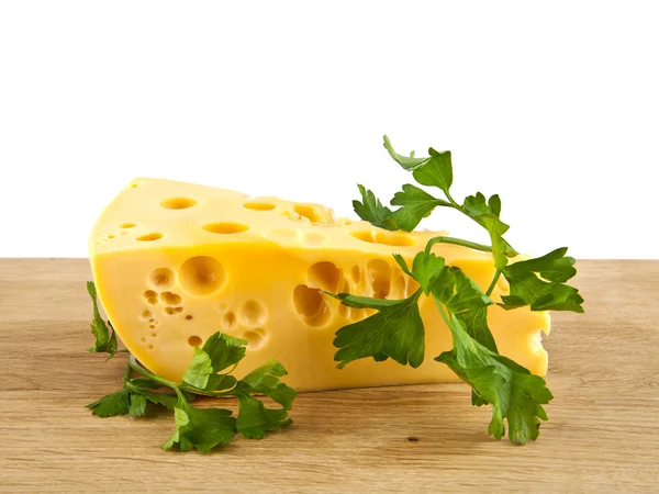 Cheese on wooden table — Stock Photo, Image