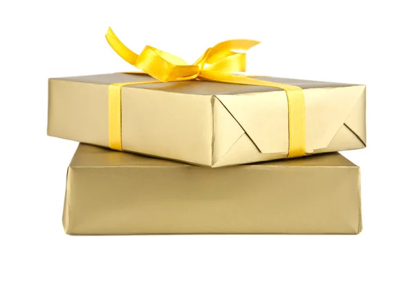 Caixas douradas com presentes — Fotografia de Stock