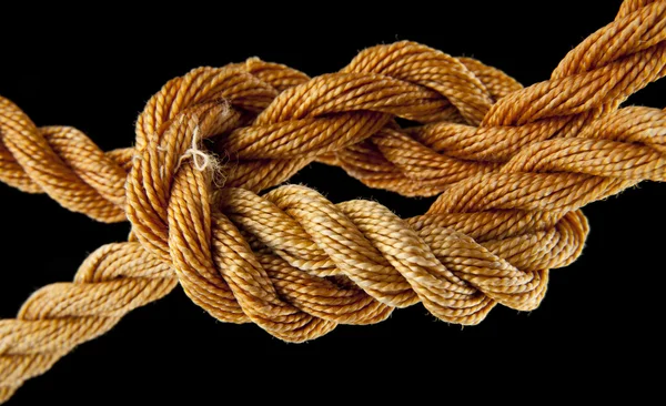 Rope knotted on black — Stock Photo, Image