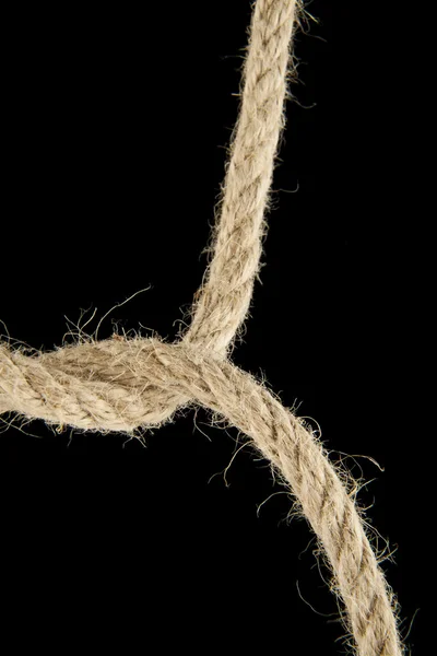 Rope knotted on black — Stock Photo, Image