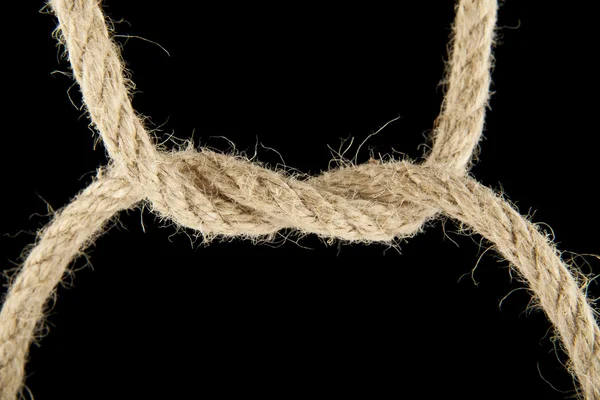 Rope knotted on black — Stock Photo, Image