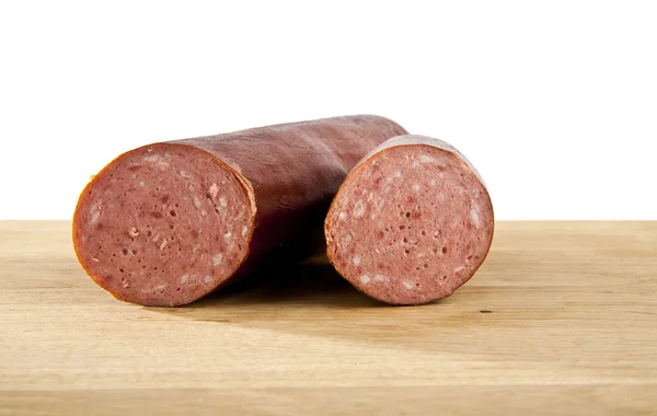 Salami sausage on wood — Stock Photo, Image
