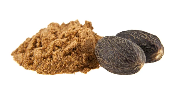 Dry nutmeg on white — Stock Photo, Image