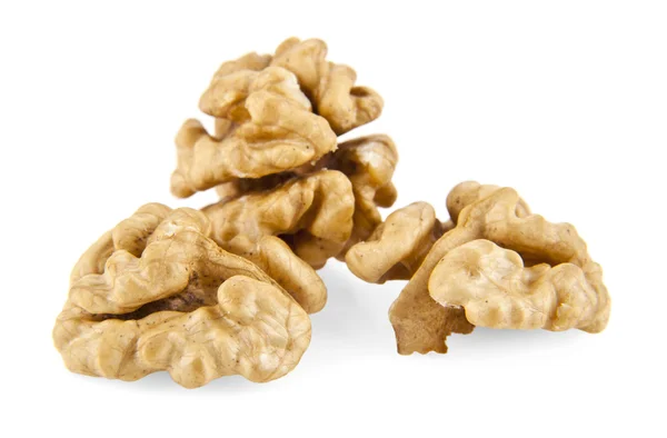 Сушеные орехи на белом — стоковое фото