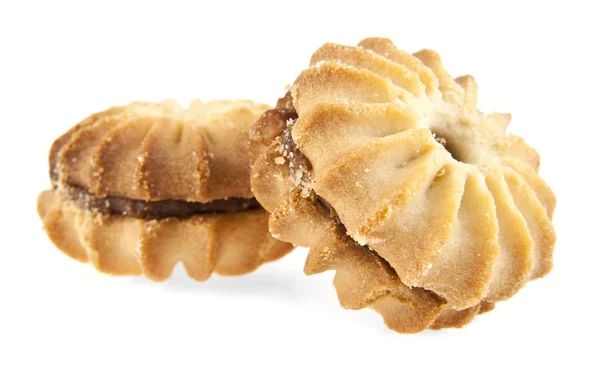 Smakelijke cookies op wit — Stockfoto