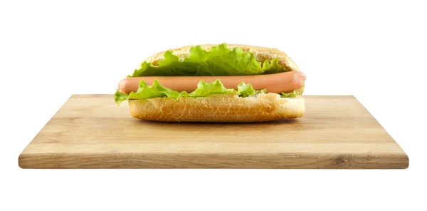 Hotdog op snijplank — Stockfoto