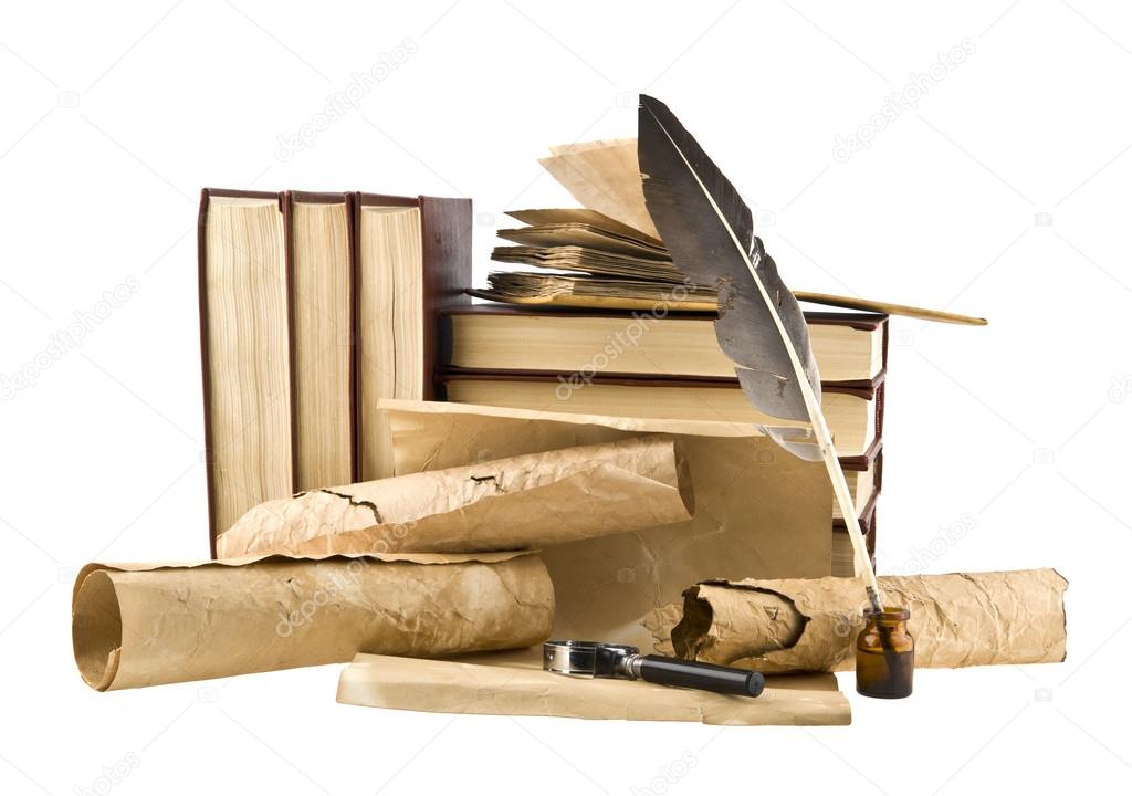 old book, quill and paper scrolls