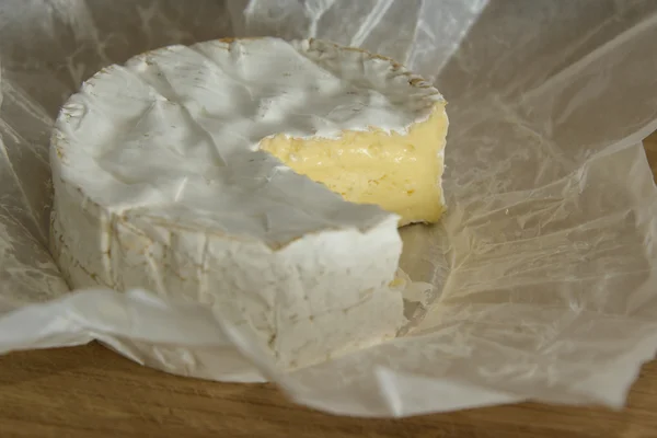 Camembert on a wooden board — Stock Photo, Image