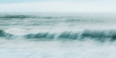 Intentional camera movement of ocean wave clipart