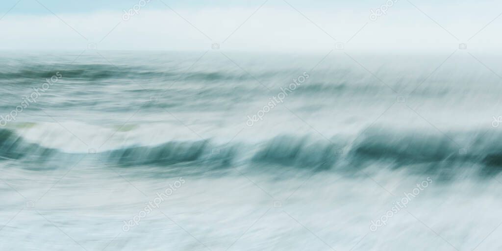 Intentional camera movement of ocean wave